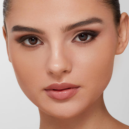 Application of Trish McEvoy cream bronzer on skin