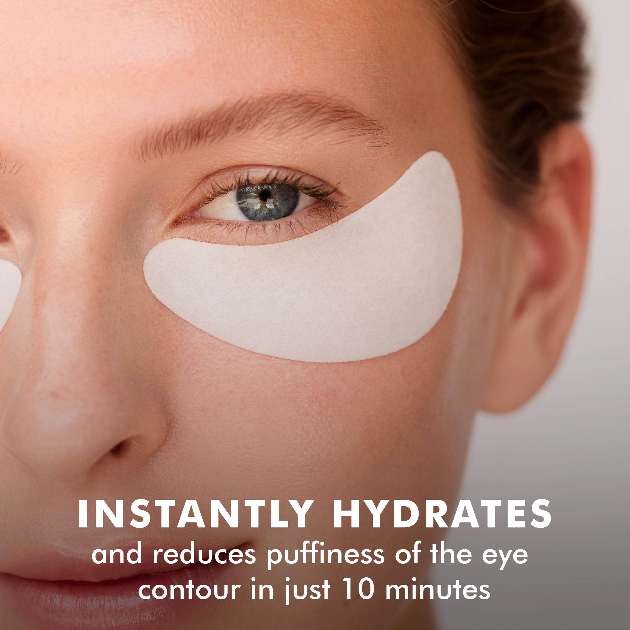 Close up of Skyn Iceland hydrogel patches applied under eyes