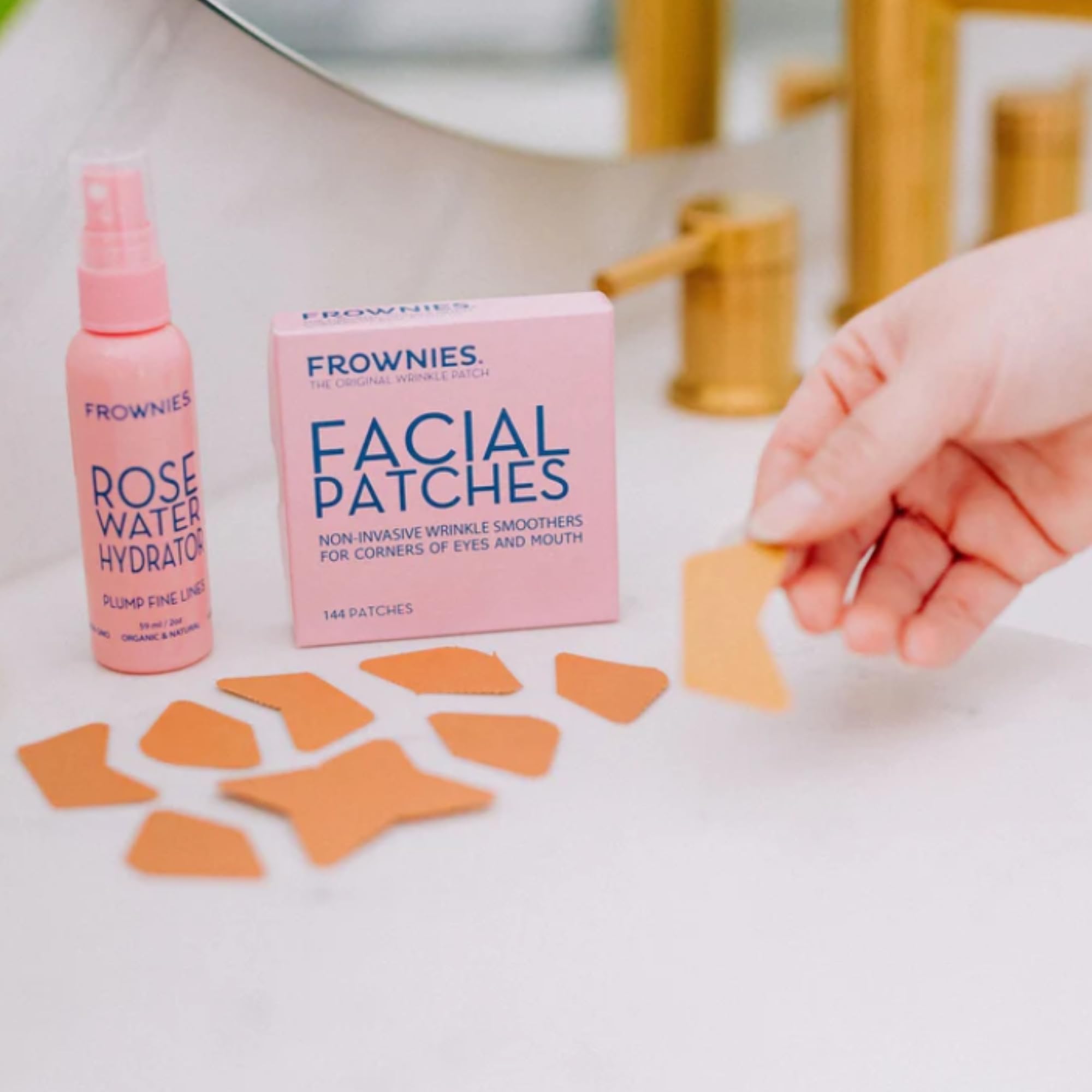 Frownies hypoallergenic face tape for smile lines and marionette lines highlighting the full one hundred forty four count box.