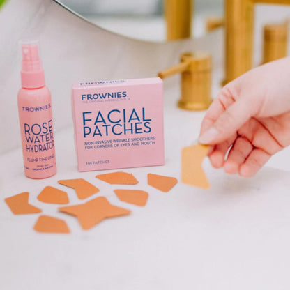 Frownies hypoallergenic face tape for smile lines and marionette lines highlighting the full one hundred forty four count box.