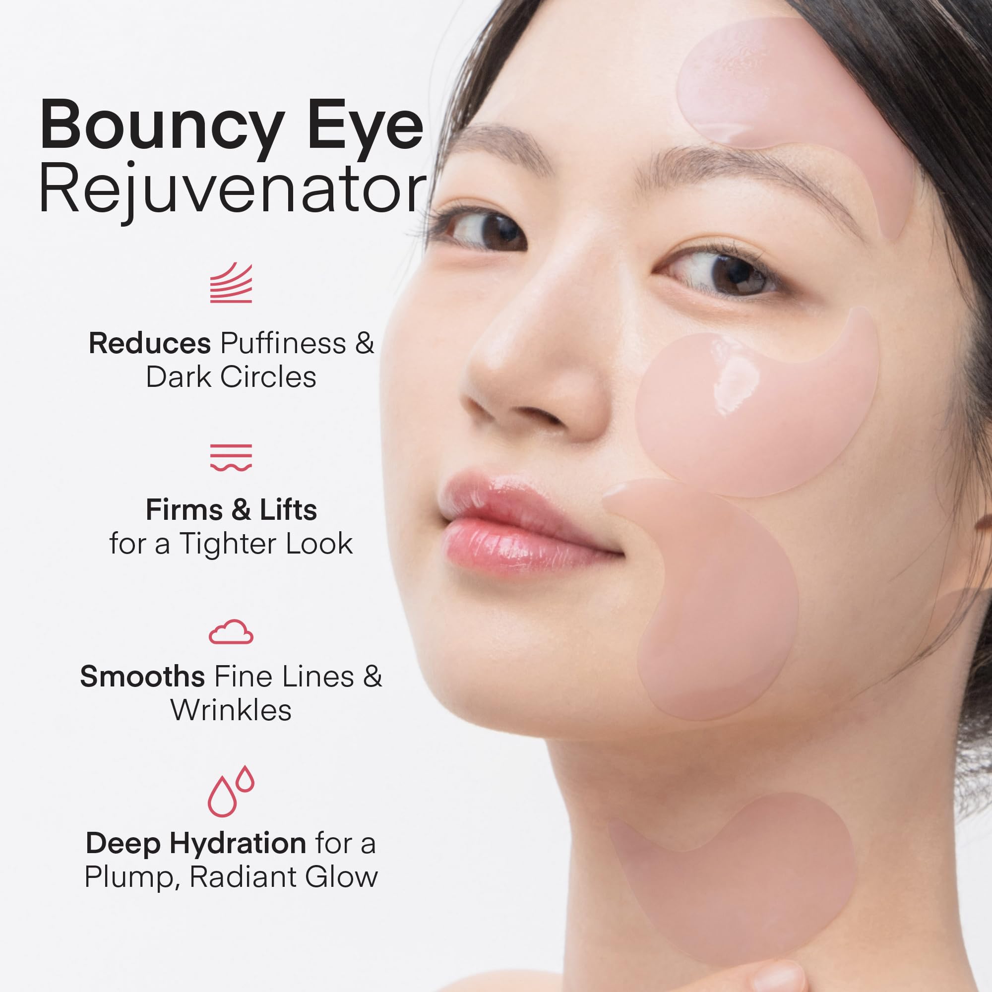 Pink hydrogel eye masks by Terez And Honor applied under the eyes for depuffing
