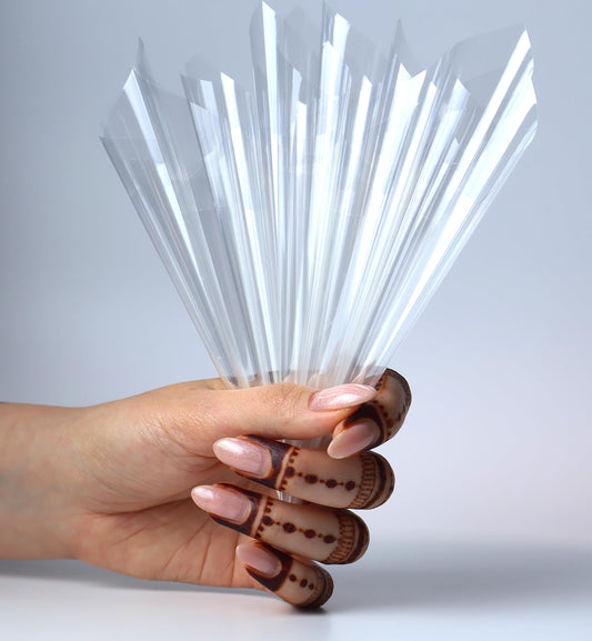 Close up of twenty holographic empty mehendi cones with silver pins inserting into the tips