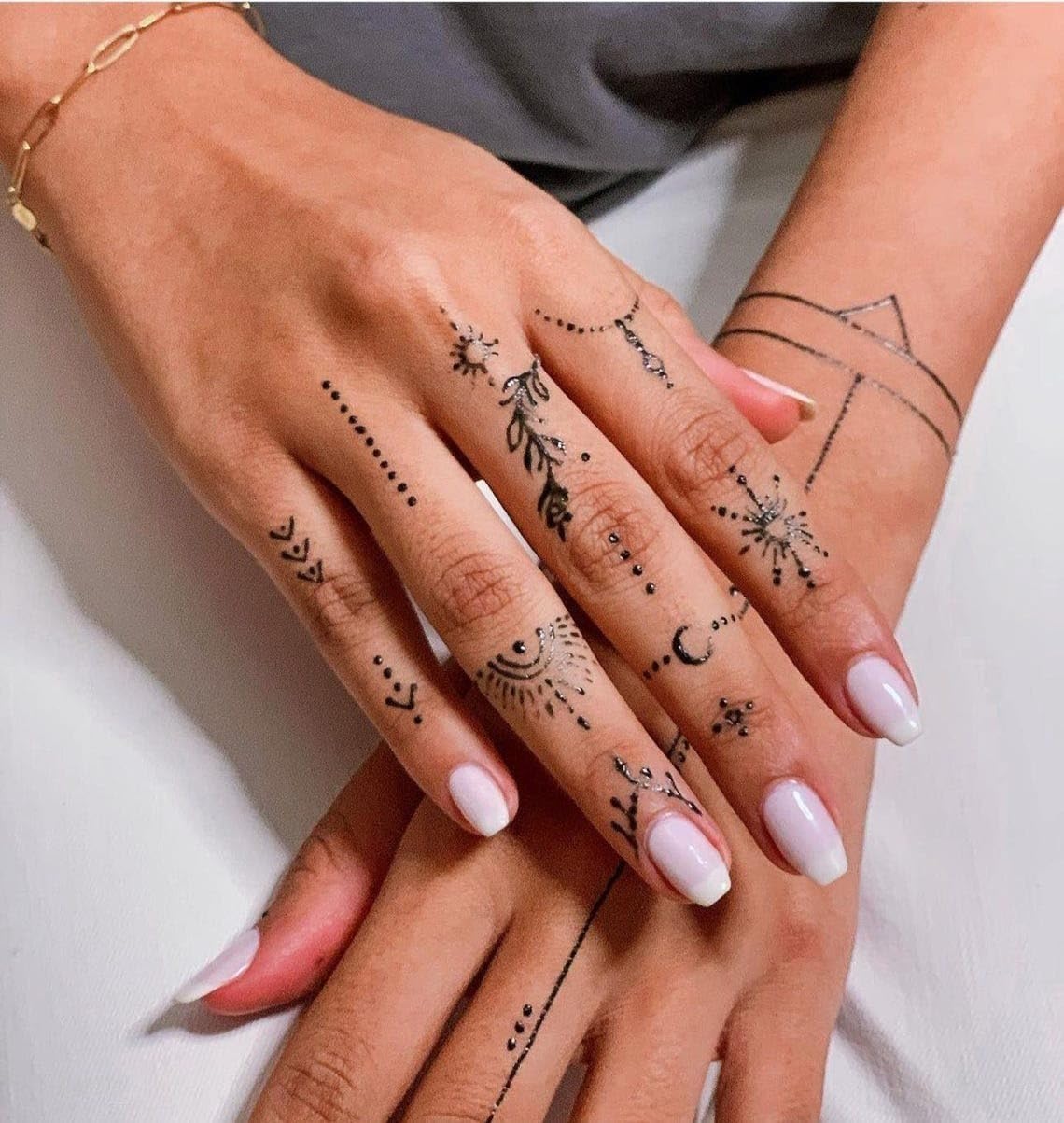Close-up of the fine tip opening and pin closure on the plant-based temporary tattoo cone