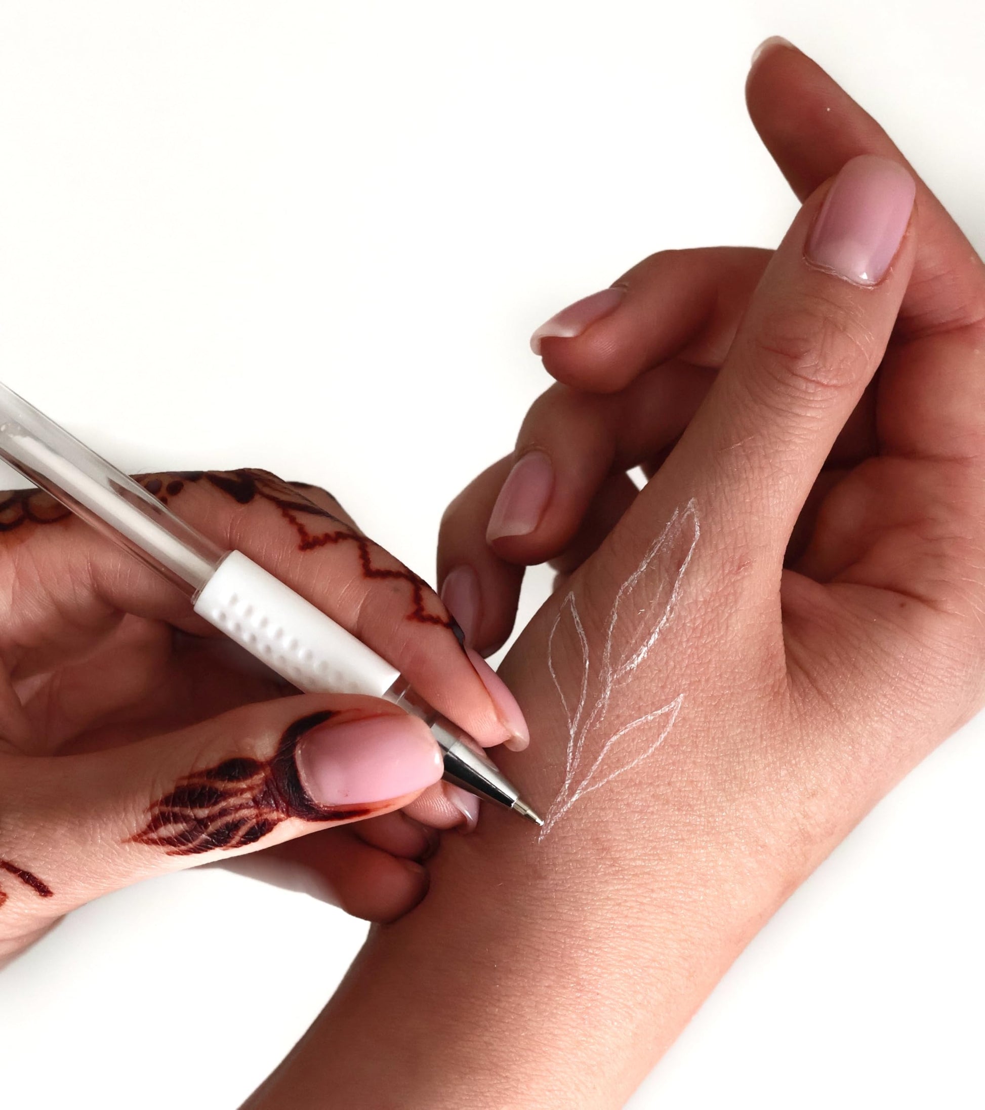 Three piece white gel ink contour pens for temporary mehendi and henna sketching on hands