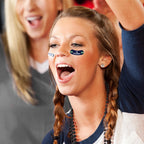 Person applying NFL game day temporary tattoo on cheek