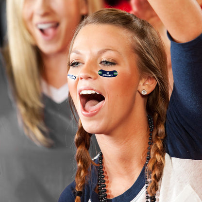 Person applying NFL game day temporary tattoo on cheek