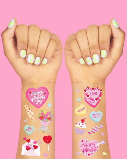 Close up of Xo, Fetti heart and candy tattoo sheets