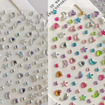 Three sheets of multi-colored hair and eye gems