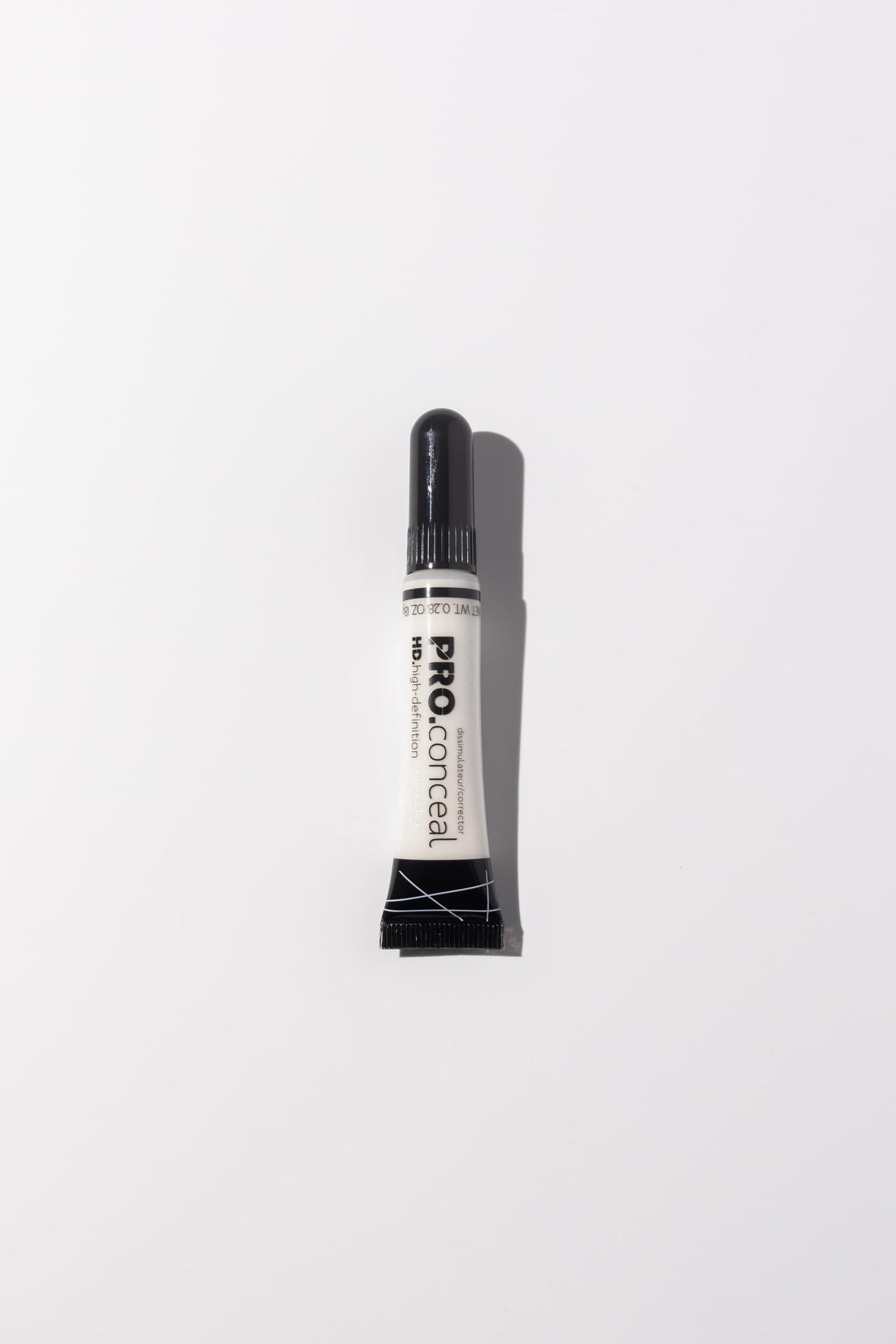 Close up of L.A. Girl professional makeup concealer tube