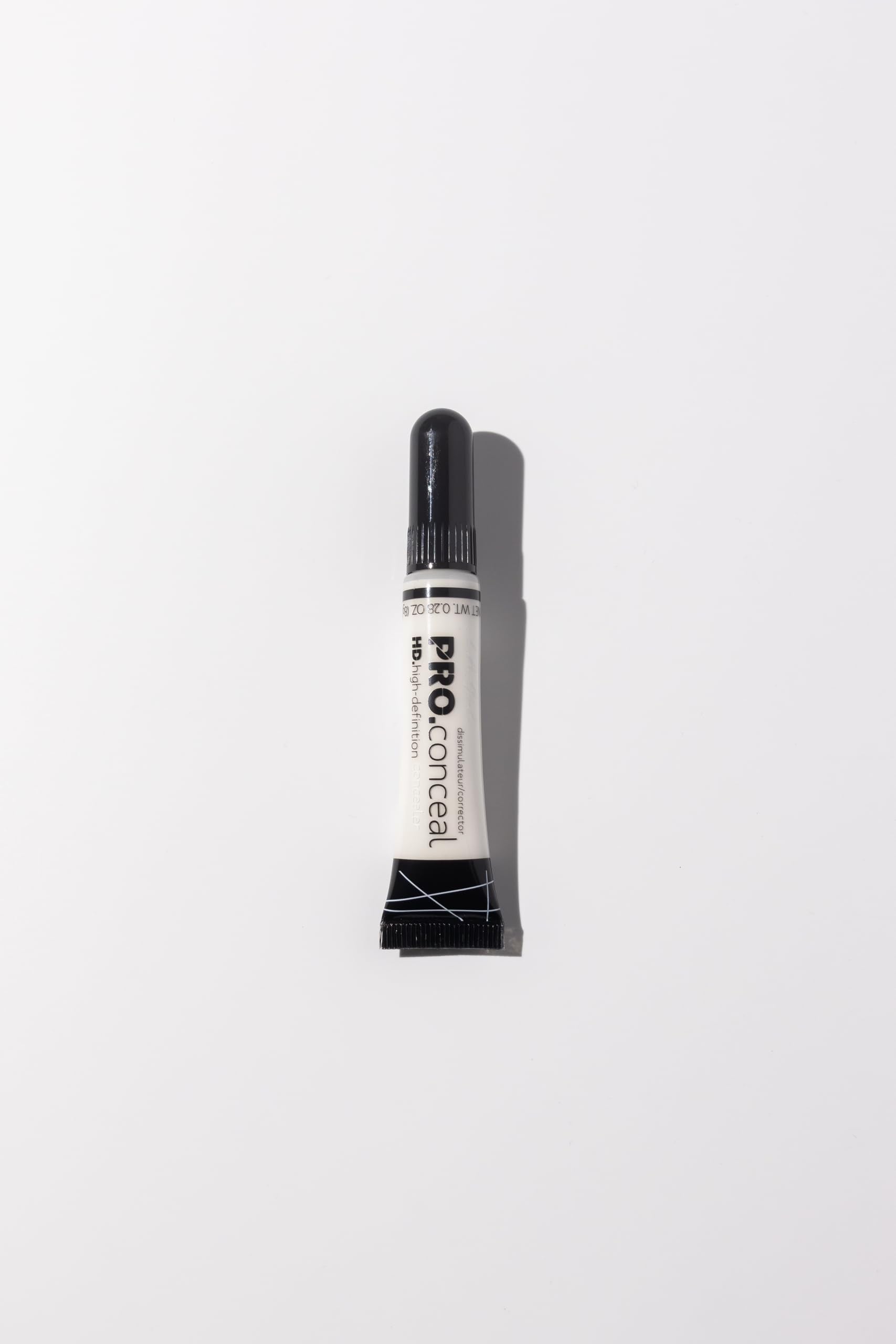 Close up of L.A. Girl professional makeup concealer tube