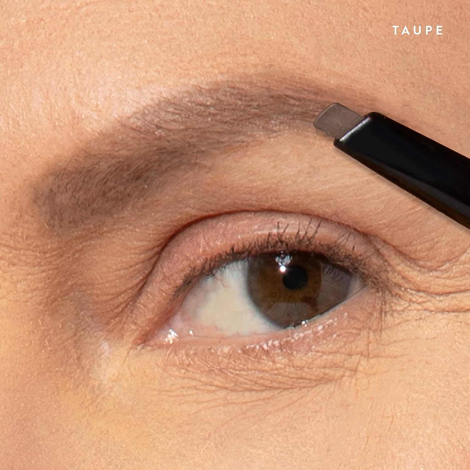 Laura Geller dual-ended eyebrow pencil and clear gel applicator in Taupe shade