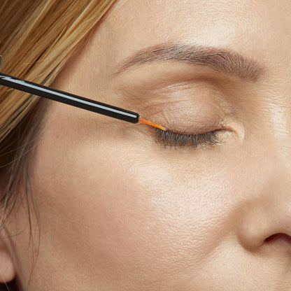 A flat lay arrangement of the Obagi Eyelash Enhancing Serum and Eyebrow Boosting Serum for daily night routines.