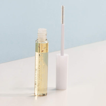 DHC lash growth serum bottle with premium gold accents