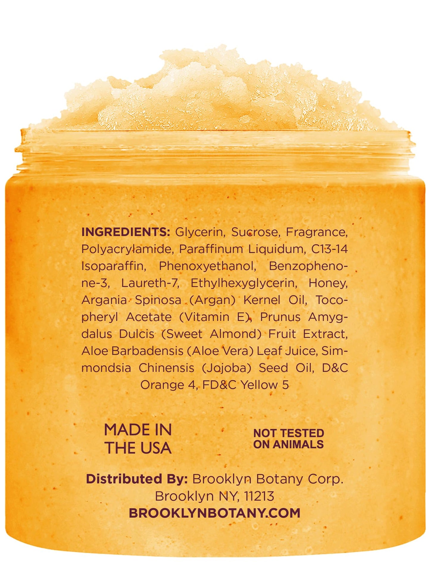 Brooklyn Botany exfoliating sugar scrub jar showing product labels and ingredients list.