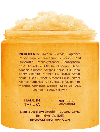 Brooklyn Botany exfoliating sugar scrub jar showing product labels and ingredients list.