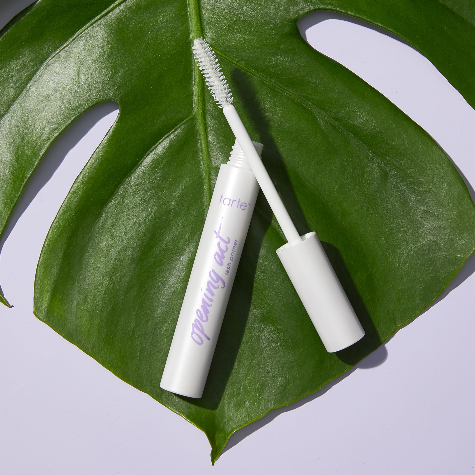 White-tinted formula texture of Tarte eyelash primer closeup