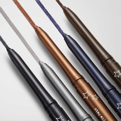 Professional makeup artist using Stila waterproof eyeliner