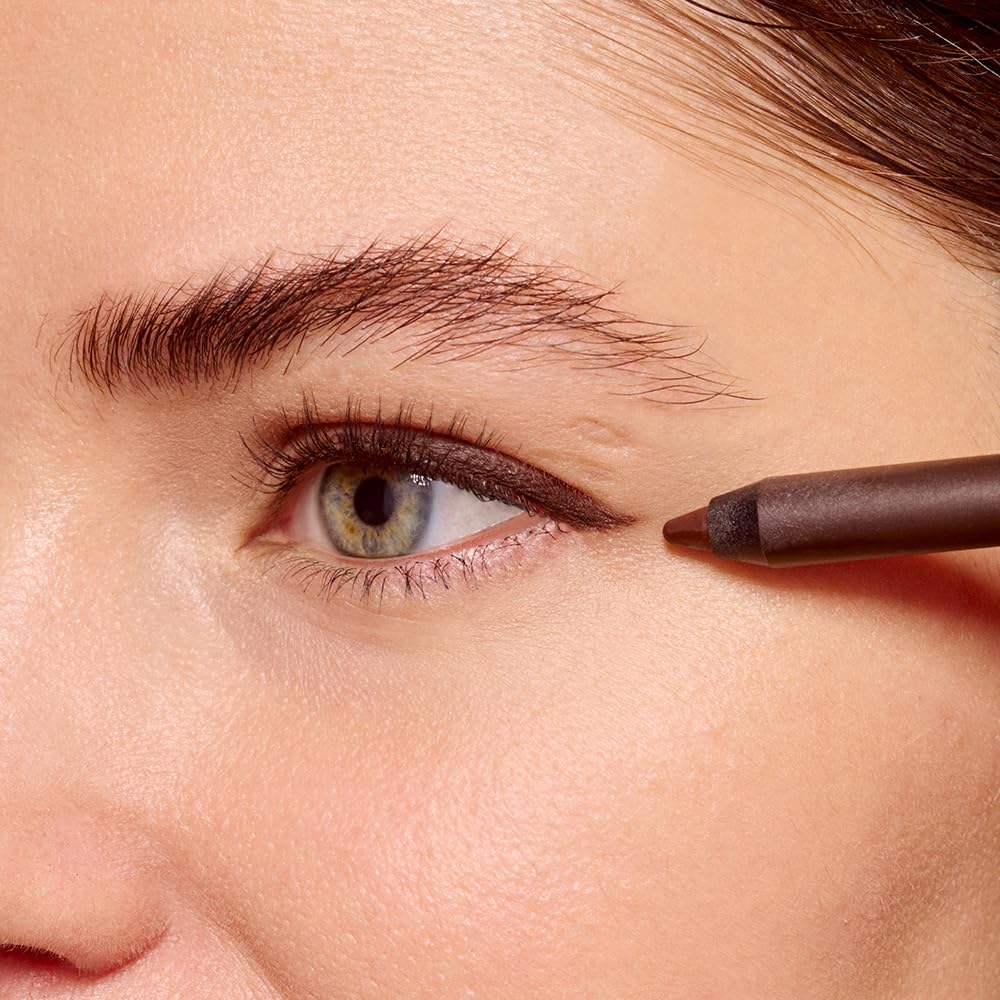 Model wearing winged eyeliner using Essence Stay and Play gel pencil