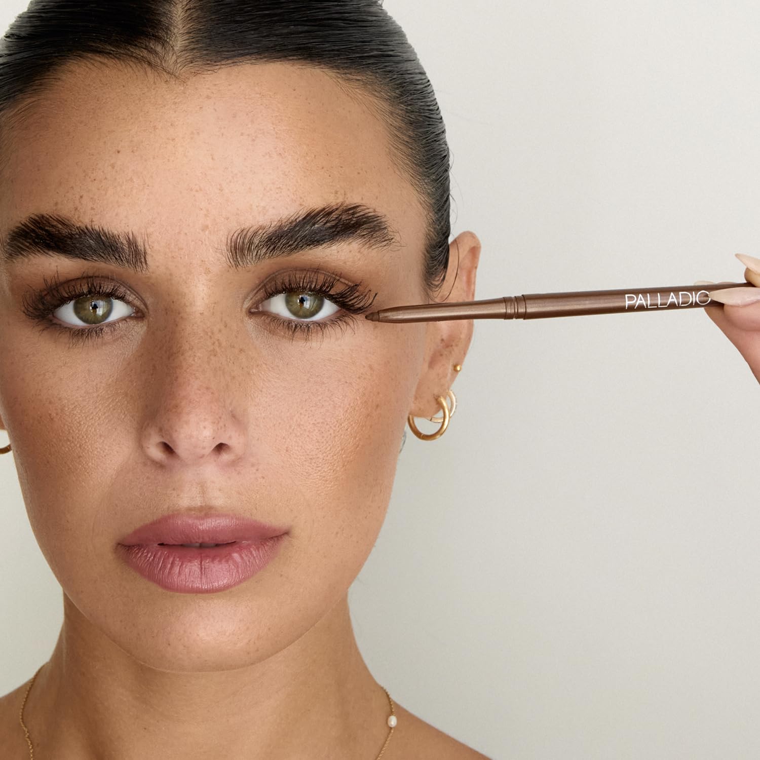 Lifestyle shot of Palladio Retractable Waterproof Eyeliner