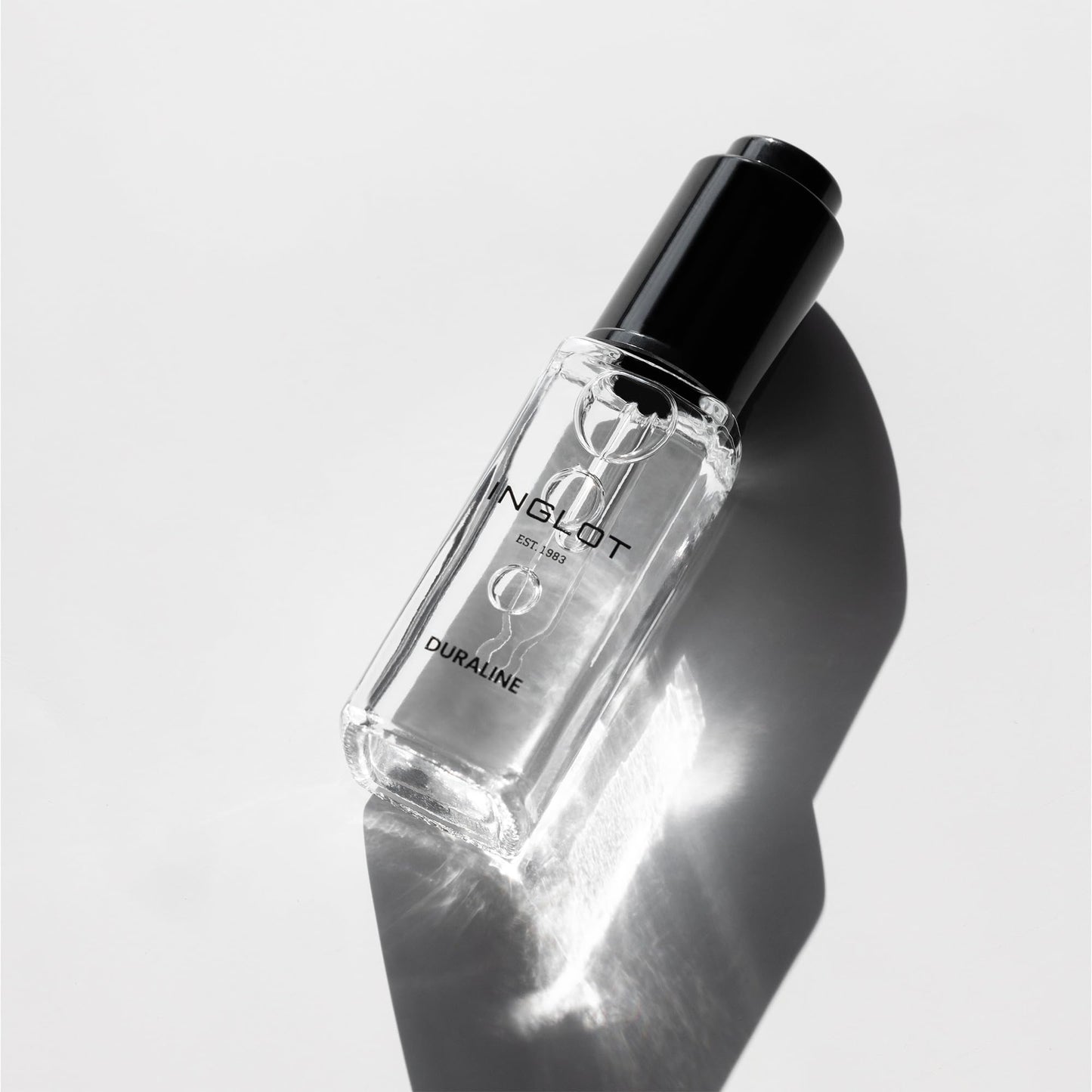 Close up of Inglot Duraline glass dropper and bottle