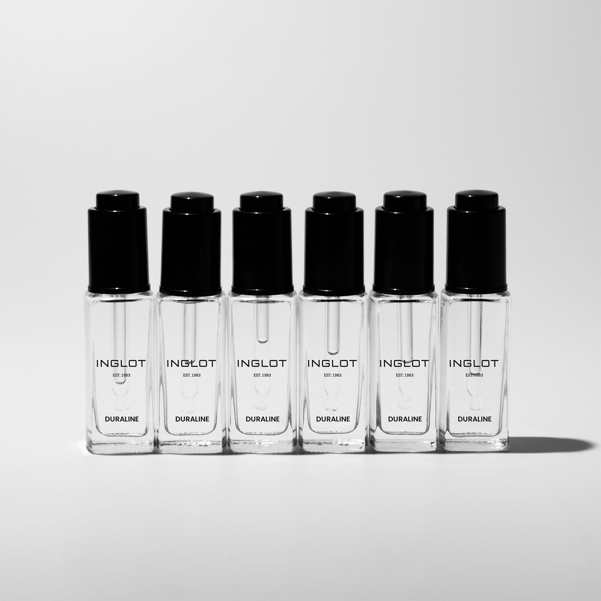 Inglot Duraline bottle with professional makeup kit