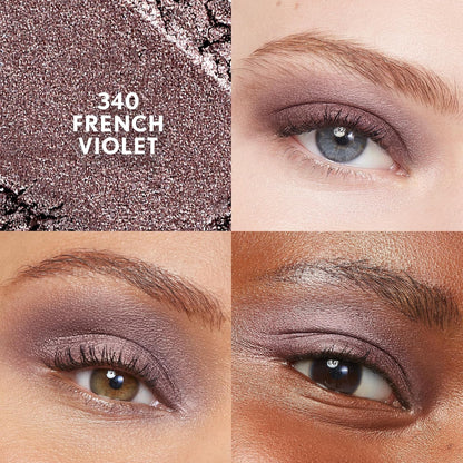 CoverGirl French Violet eyeshadow stick held in hand