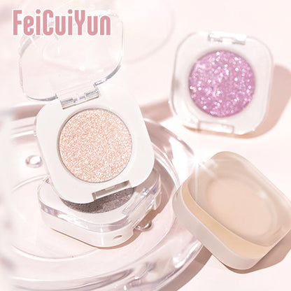 Travel-friendly size FeiCuiYun glitter eyeshadow in hand