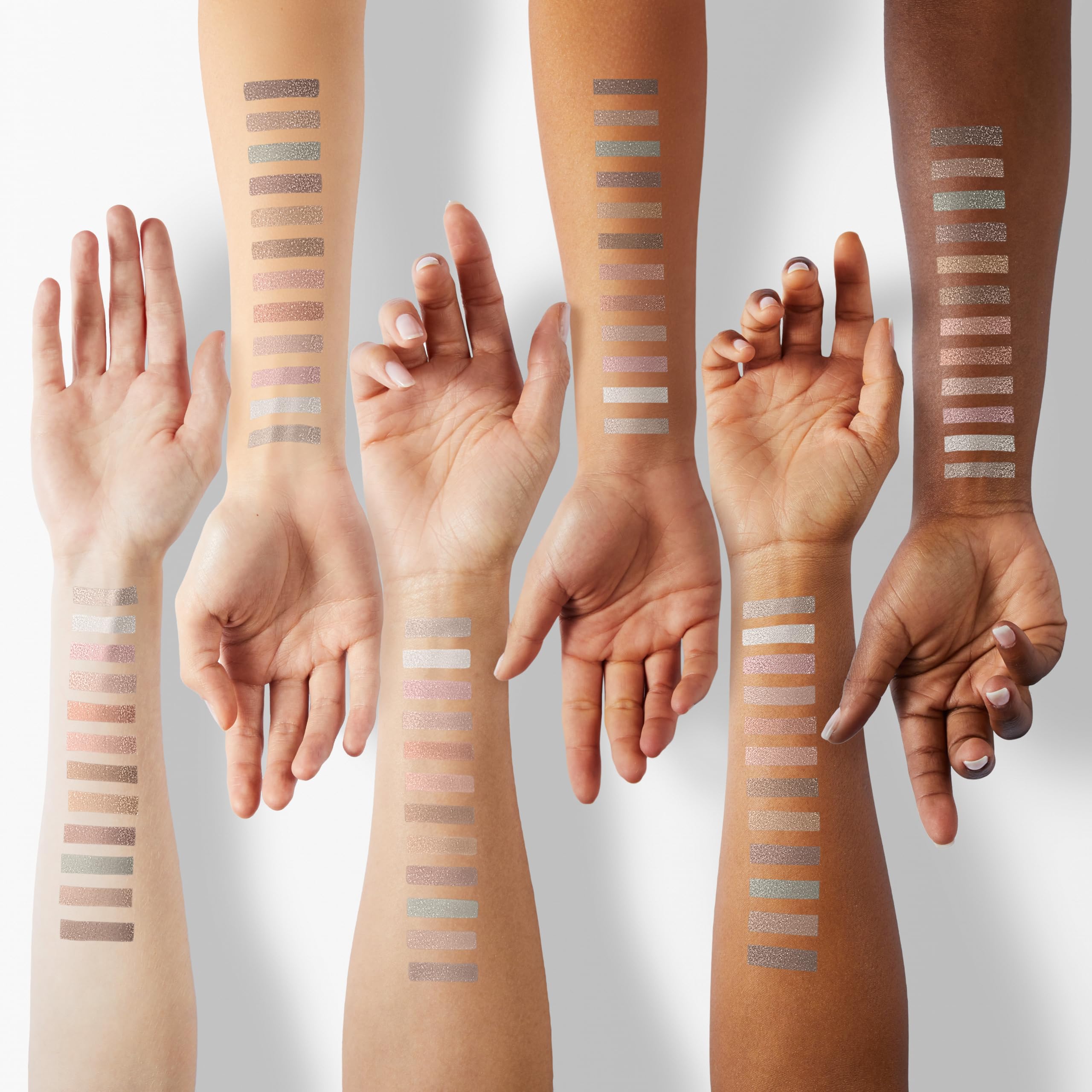 Laura Geller Earthy Essentials palette matte and shimmer swatches