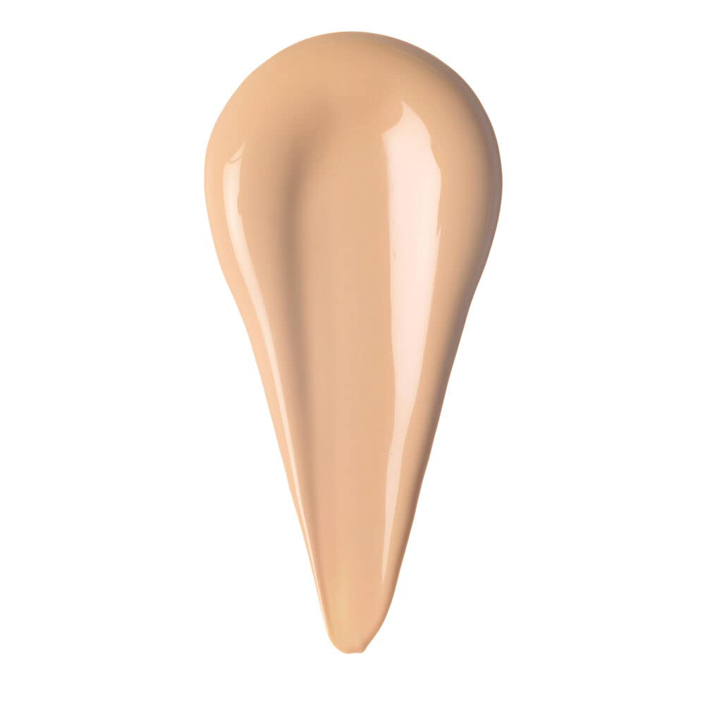 Rare Beauty eyeshadow primer wand applicator showing the peach tinted creamy formula