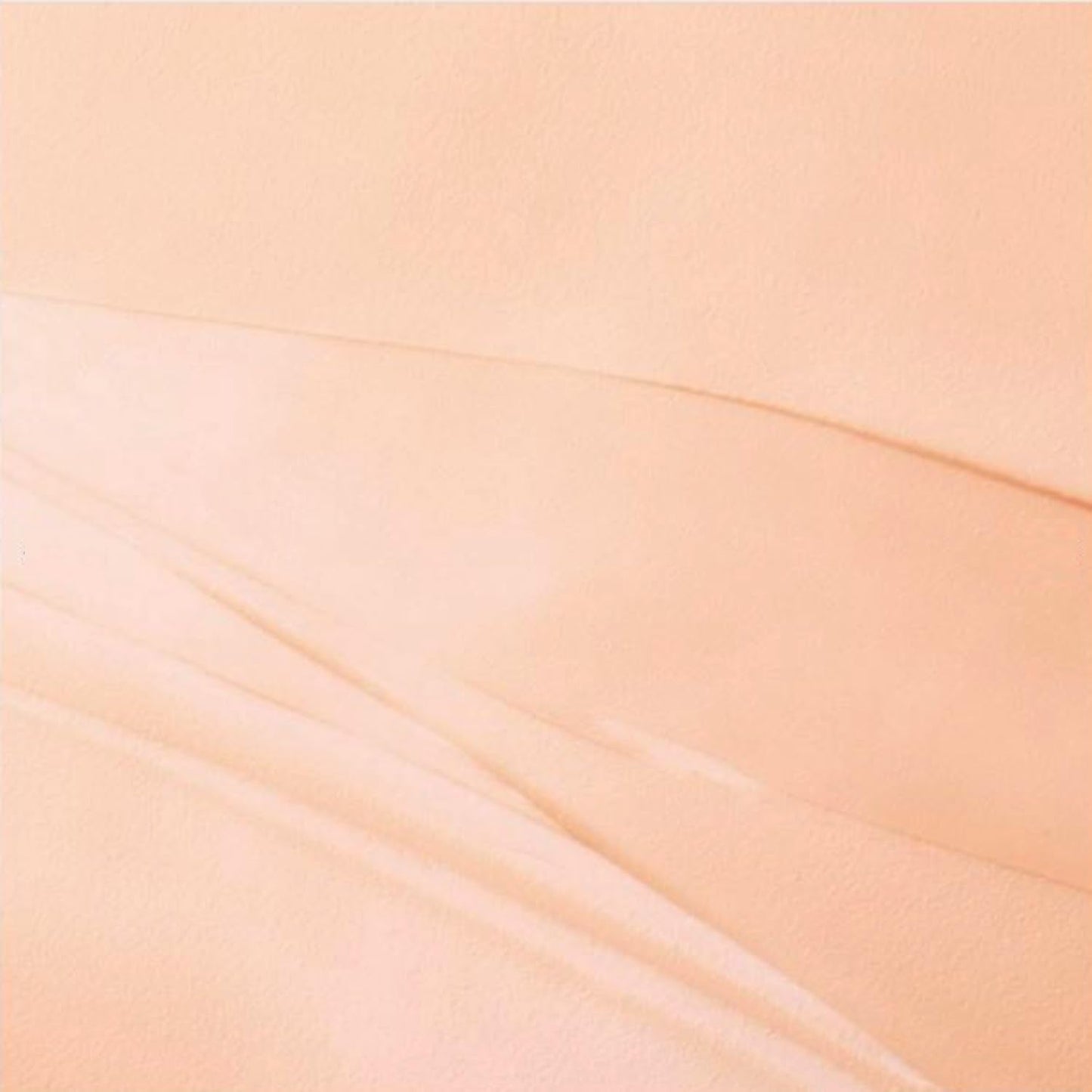 Sephora 12 Hour eyeshadow base translucent formula blurring eyelid imperfections close up