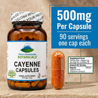 Close up view of the vegan cellulose capsules filled with premium orange red cayenne powder