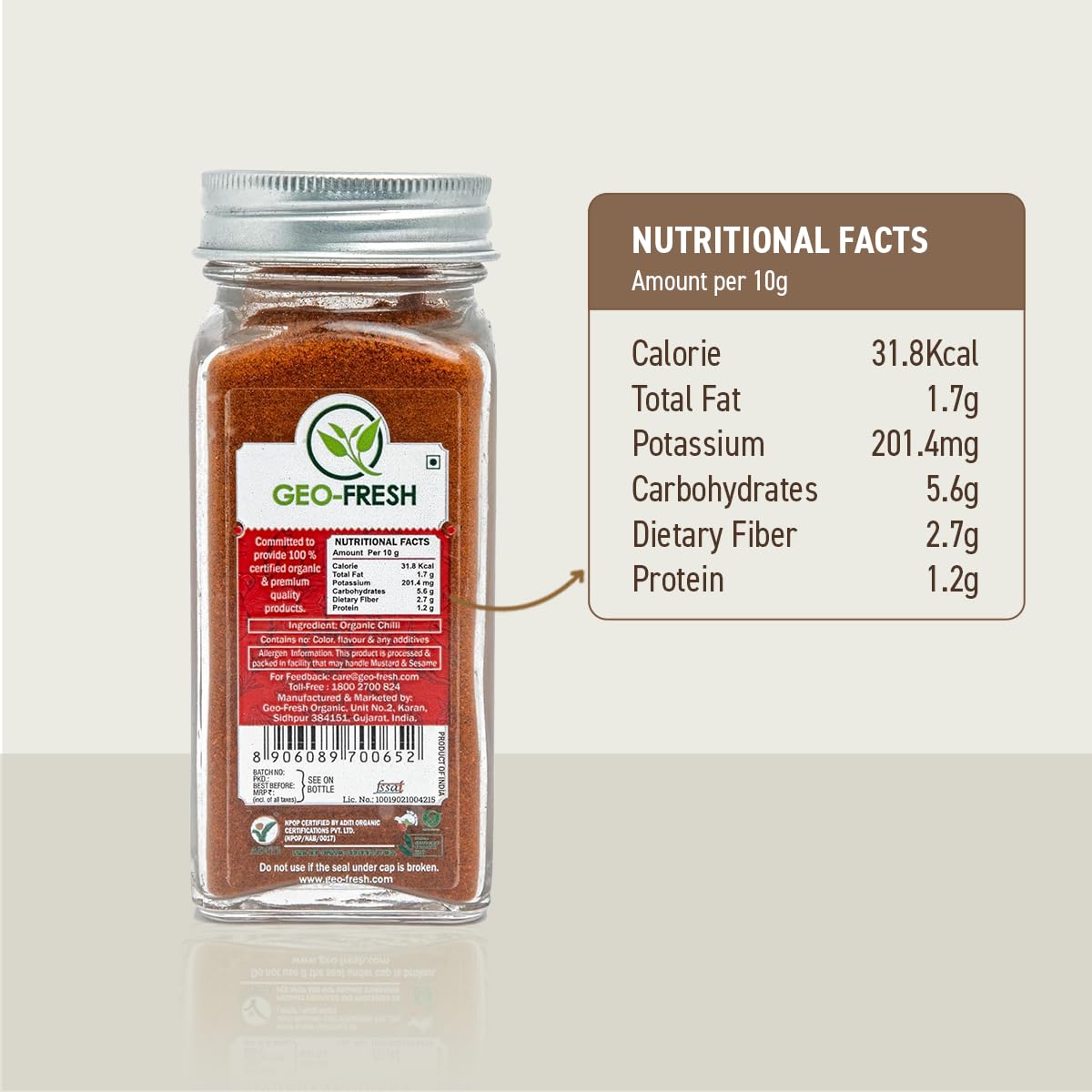 Pure ground red chili spice powder in a compact pantry jar.