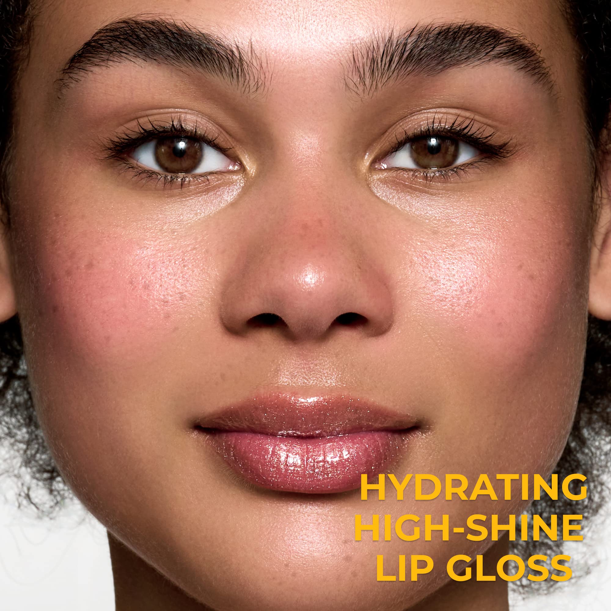 Lamel clear face and eye gloss swatch on hand demonstrating high shine
