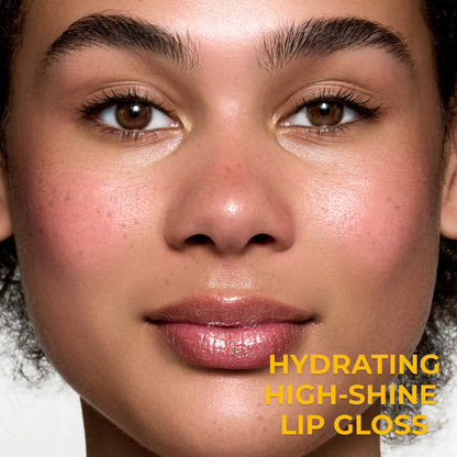 Lamel clear face and eye gloss swatch on hand demonstrating high shine