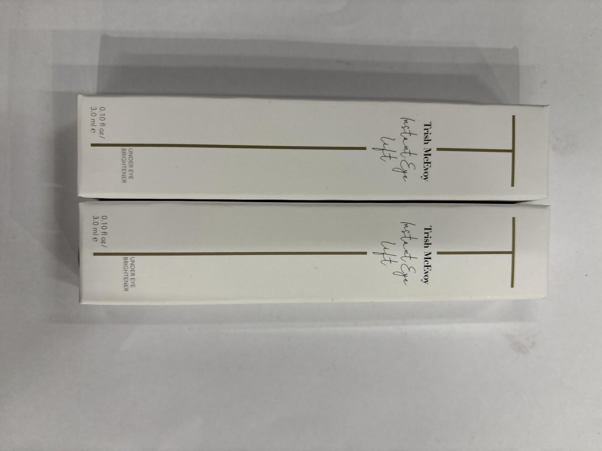 Long wearing anti fatigue eye lift cosmetic treatment bottle angle.
