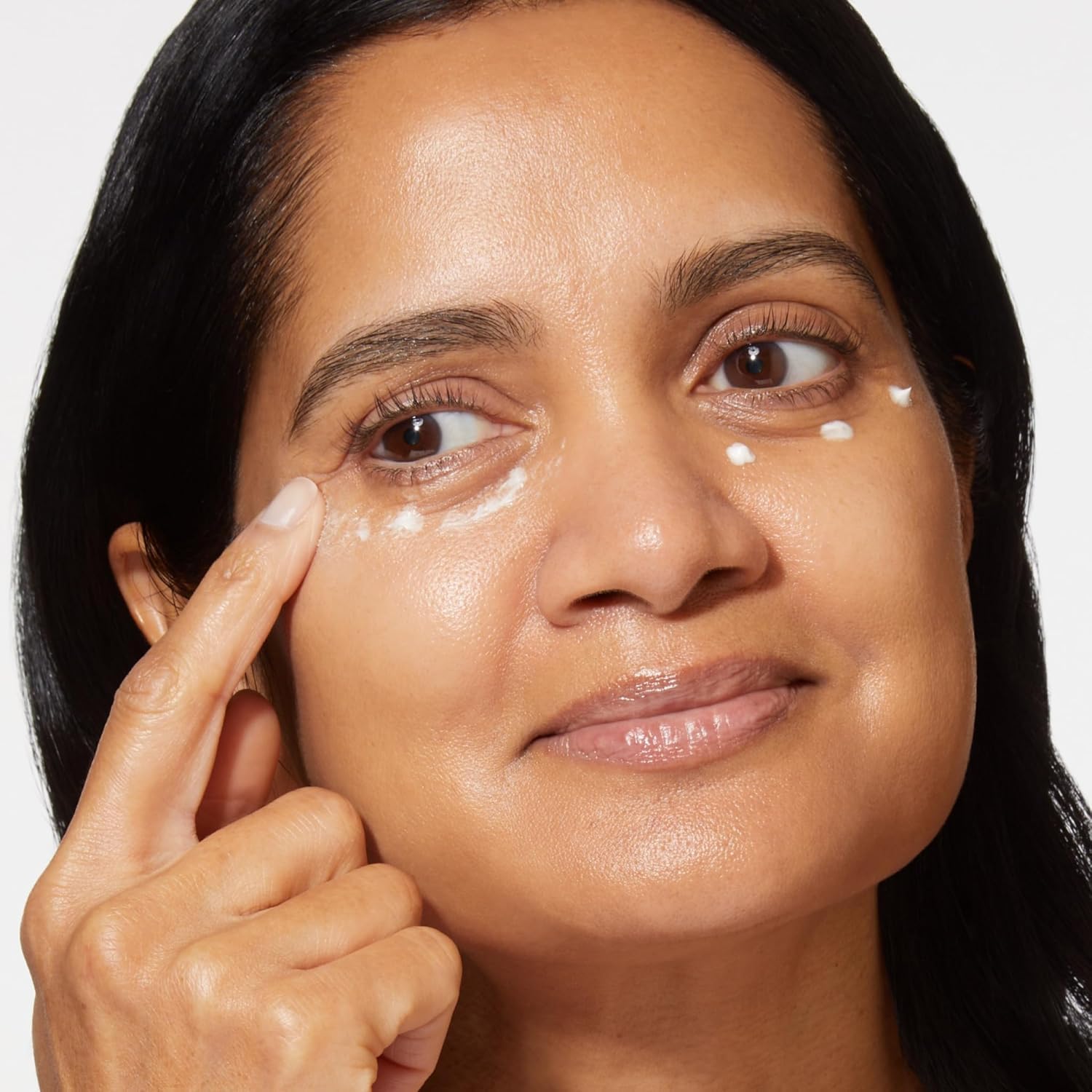 Under eye makeup primer for mature skin close up angle