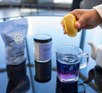 Steepers Only Slumber Party relaxation tea packaging showcased next to loose dried chamomile and lavender flowers