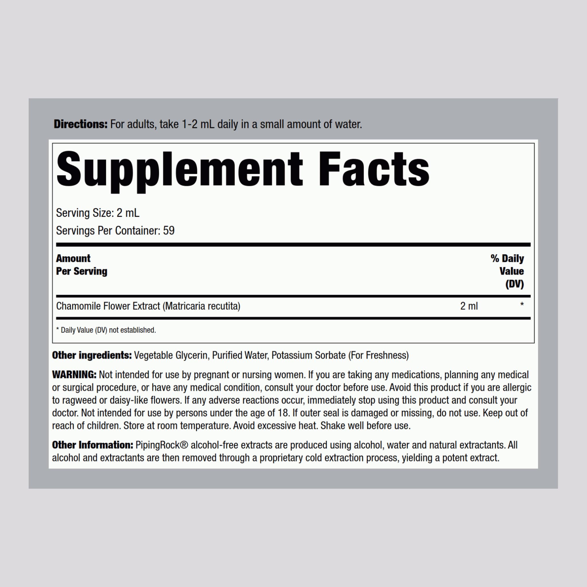 Close-up of the supplement facts and ingredients label on the back of the Piping Rock Chamomile tincture.