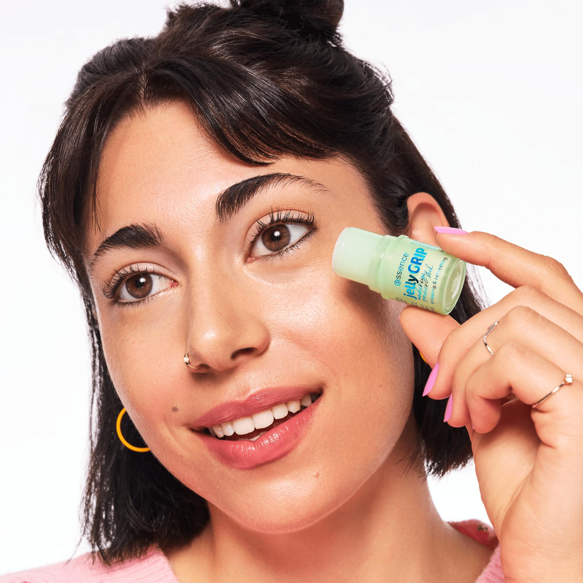 Essence Jelly Grip under eye primer being applied to prevent concealer creasing