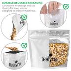Tealyra herbal bedtime loose tea showing dry ingredients including chamomile flowers and rooibos base.