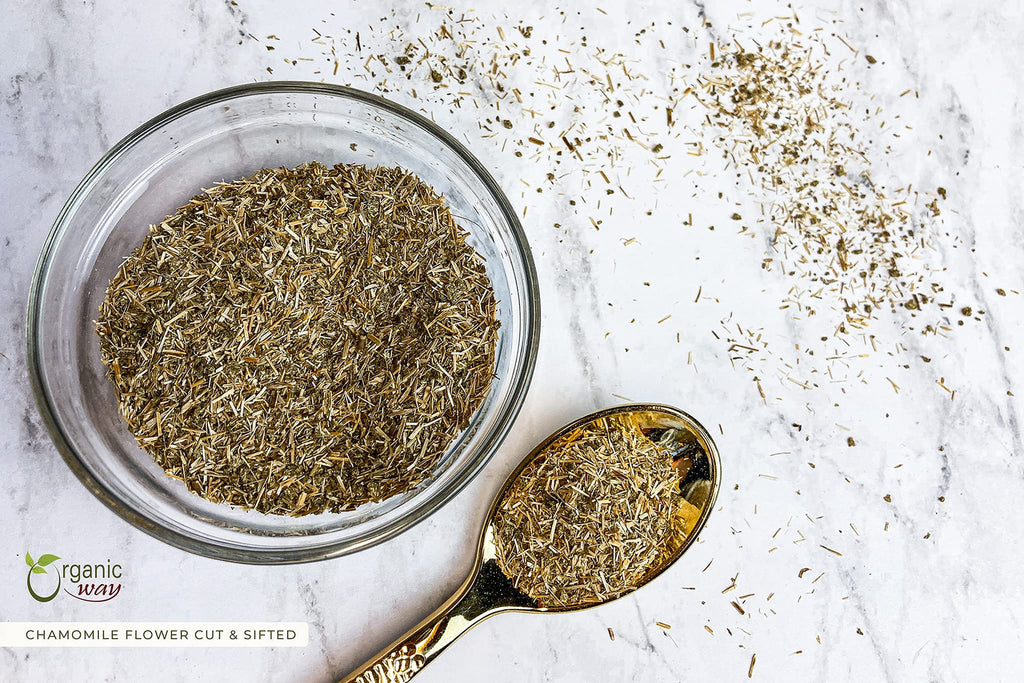 Caffeine free herbal chamomile tea infusion prepared in a clear cup.