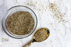 Caffeine free herbal chamomile tea infusion prepared in a clear cup.