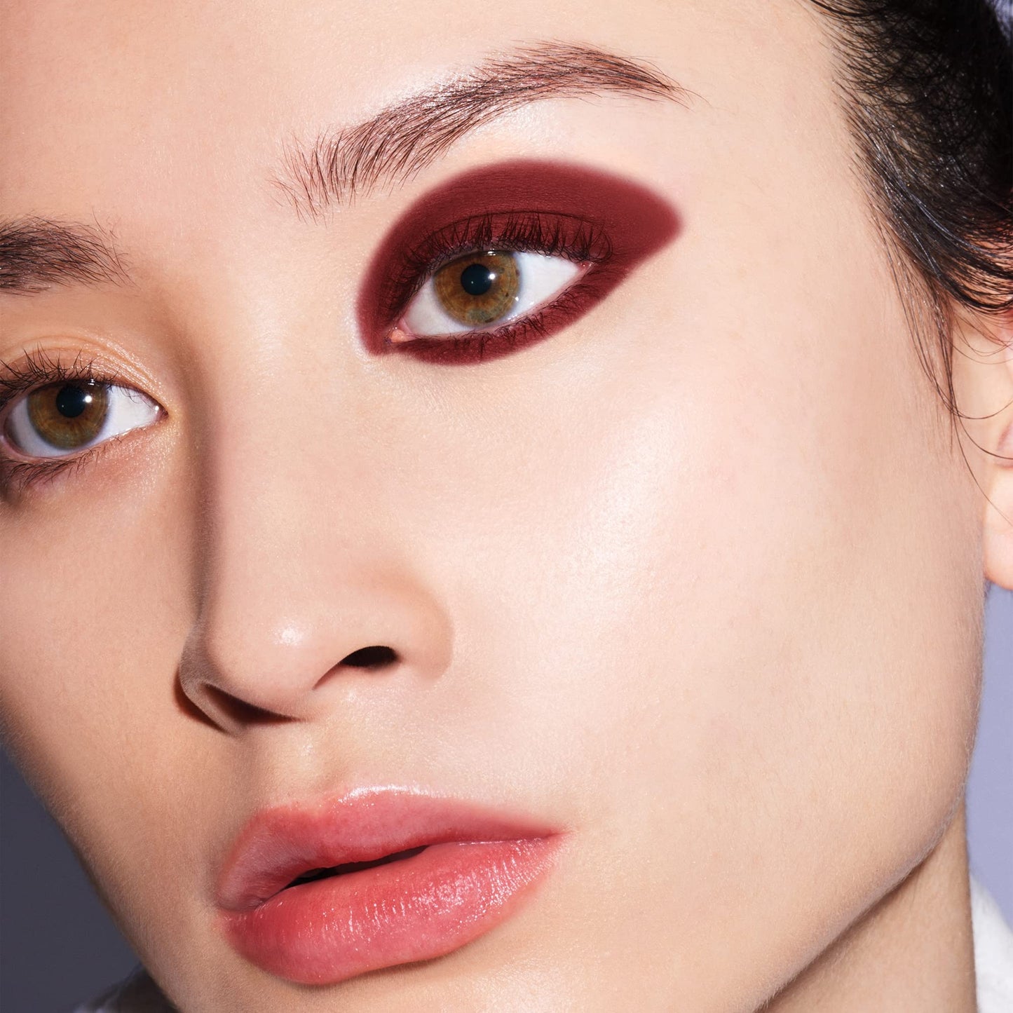Side profile of Shiseido Kajal InkArtist Azuki Red