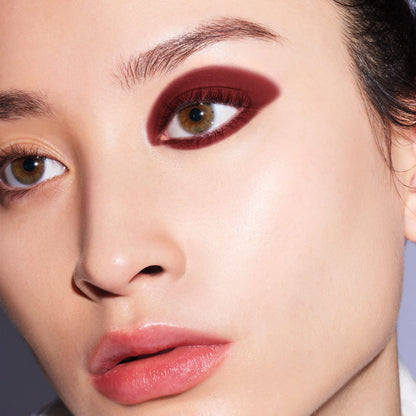 Side profile of Shiseido Kajal InkArtist Azuki Red