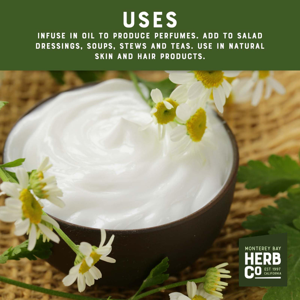 Premium whole chamomile flowers poured out of the bulk pouch demonstrating product texture
