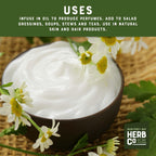 Premium whole chamomile flowers poured out of the bulk pouch demonstrating product texture