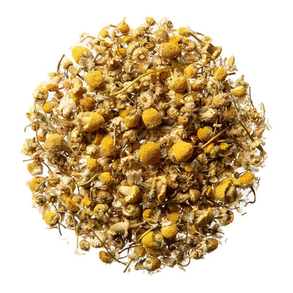 A handful of authentic unbleached German chamomile flowers sourced directly from Egypt