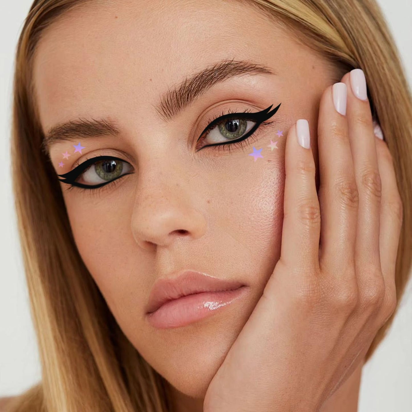 Example of winged eyeliner look created with stencil stickers