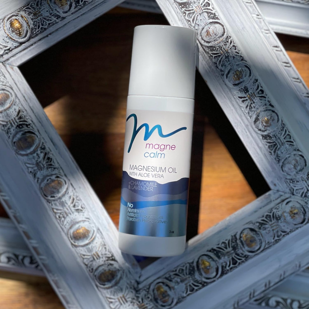 Authentic USA imported MG12 MagneCalm roll on demonstrating convenient portable packaging for natural stress and anxiety relief.