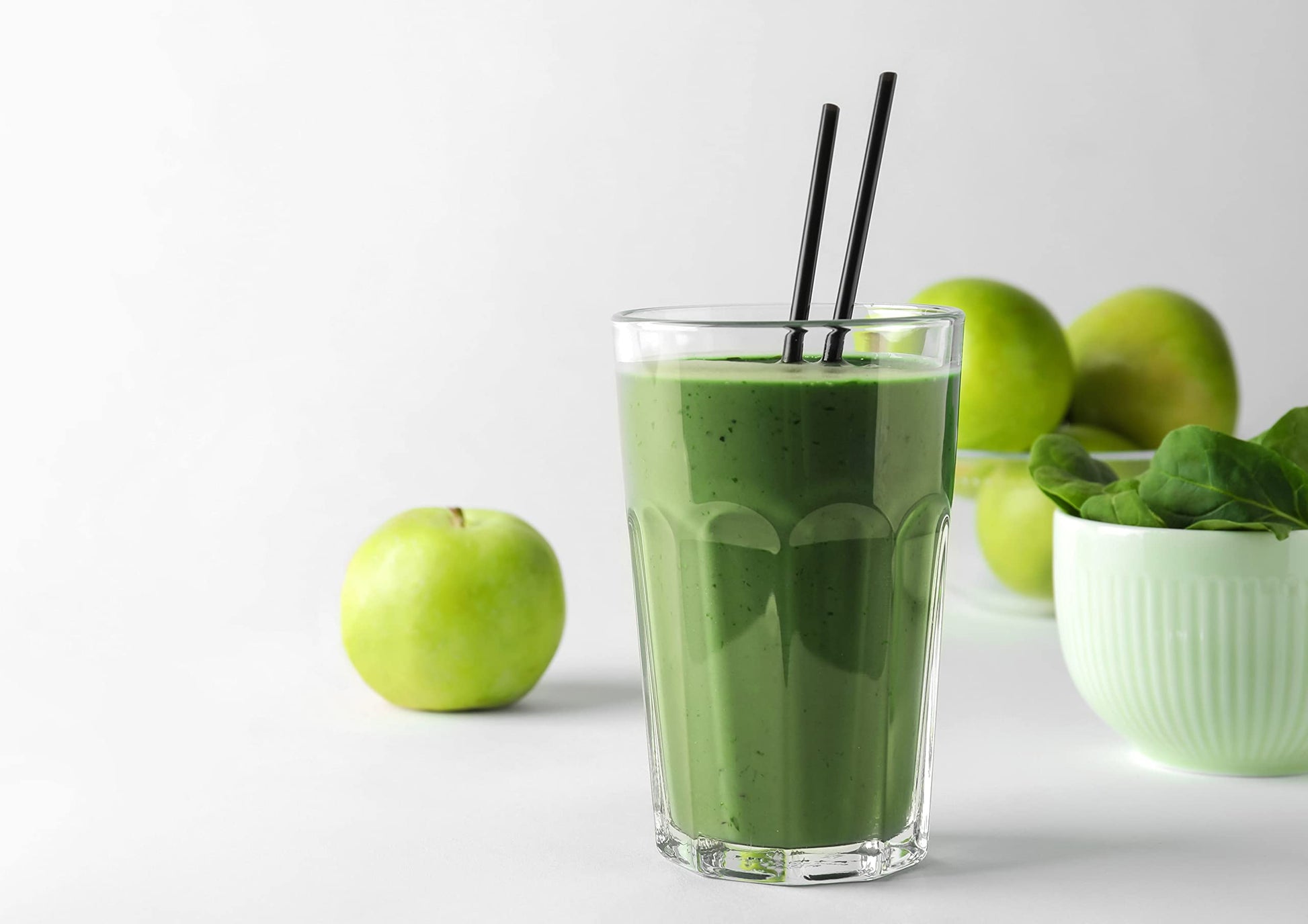 Food To Live organic supergrass powder mixed in a glass of water